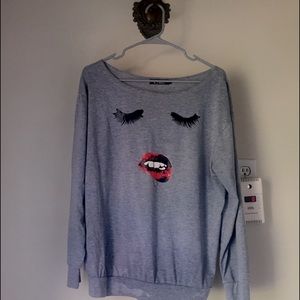 Blouse with mouth and eyes Gray L bu fits better M